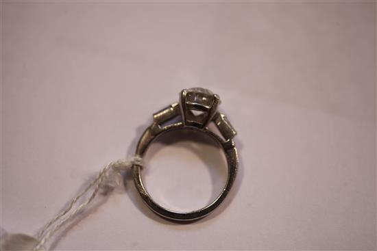 A 20th century platinum and single stone diamond ring, size K.
